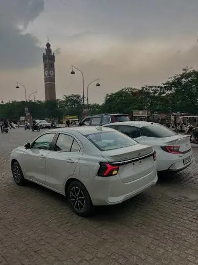 Sedan cab service by NetraCab in Surat